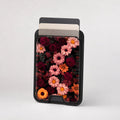 Dark Autumn Daisy Floral MagSafe card holder showing the patterned front