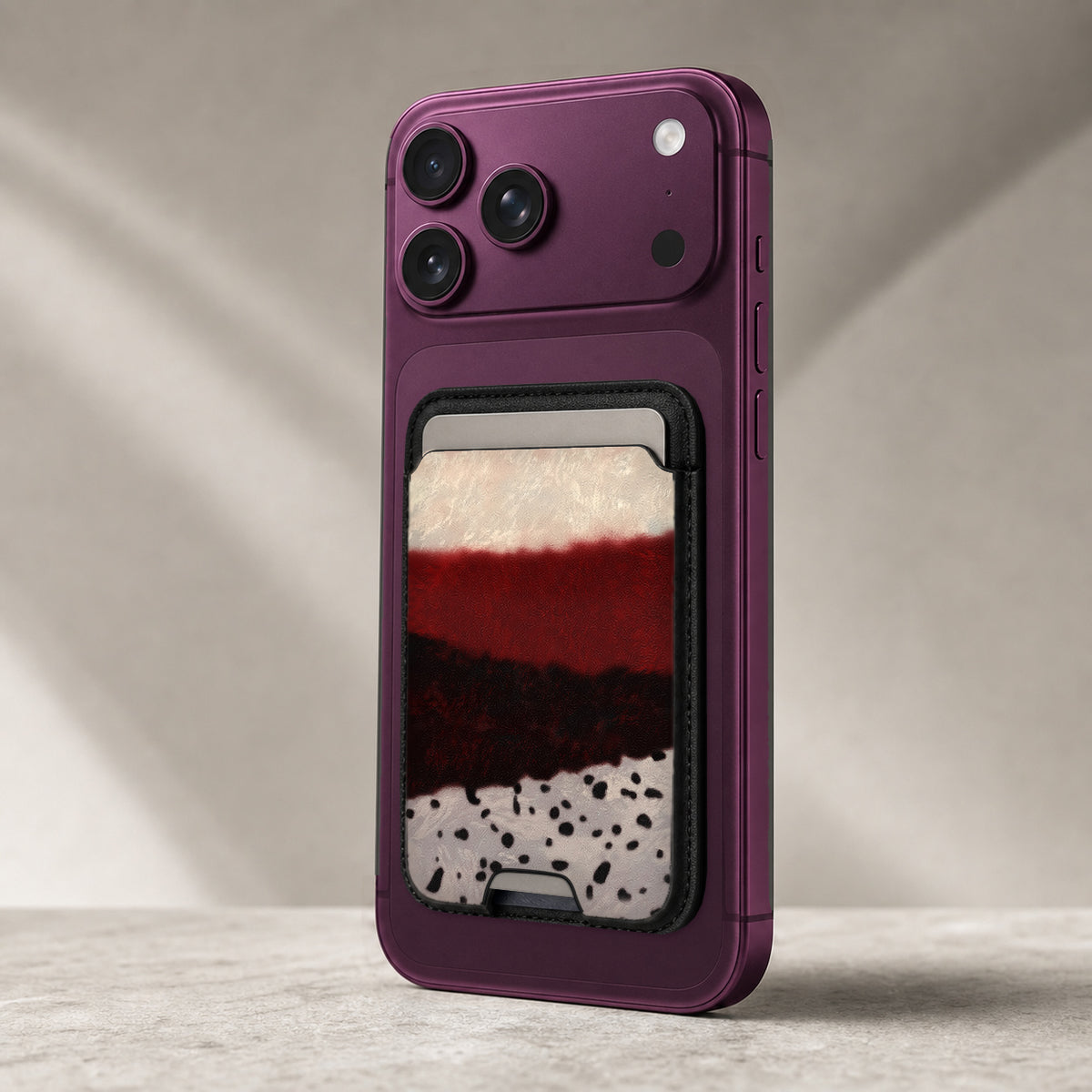 Burgundy Cream Abstract Animal Print MagSafe card holder showing the detailed leather finish