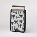 Blue Coquette Bow MagSafe card holder showing the patterned front