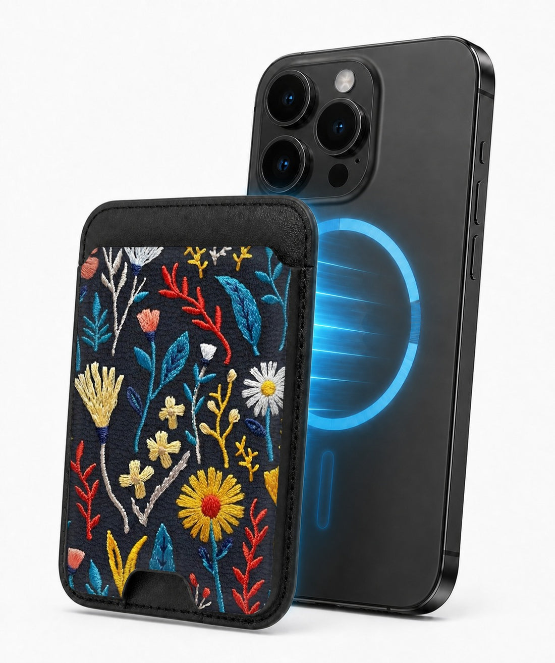 Navy Embroidered Wildflower MagSafe card holder attached to a compatible iPhone