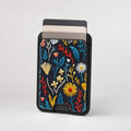 Navy Embroidered Wildflower MagSafe card holder showing the patterned front
