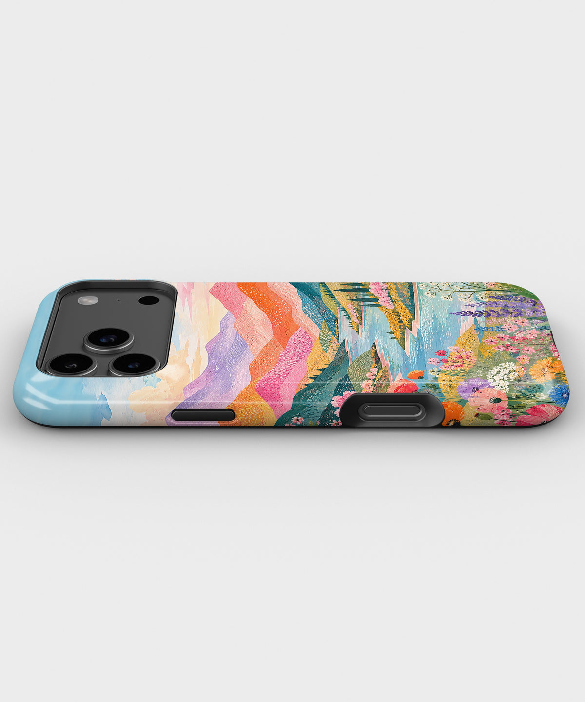 Pastel Mountain Lake Floral MagSafe iPhone Tough Case low angle lifestyle product view