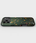 Dark Meadow Wildflower MagSafe iPhone Tough Case low angle lifestyle product view