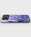 Purple Iris Watercolor MagSafe iPhone Tough Case low angle lifestyle product view