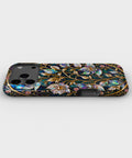 Stained Glass Floral Vine MagSafe iPhone Tough Case low angle lifestyle product view