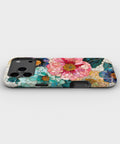 Bright Zinnia Floral MagSafe iPhone Tough Case low angle lifestyle product view