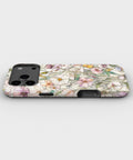 Soft Wildflower Meadow MagSafe iPhone Tough Case low angle lifestyle product view