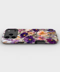 Purple Pansy Floral MagSafe iPhone Tough Case low angle lifestyle product view