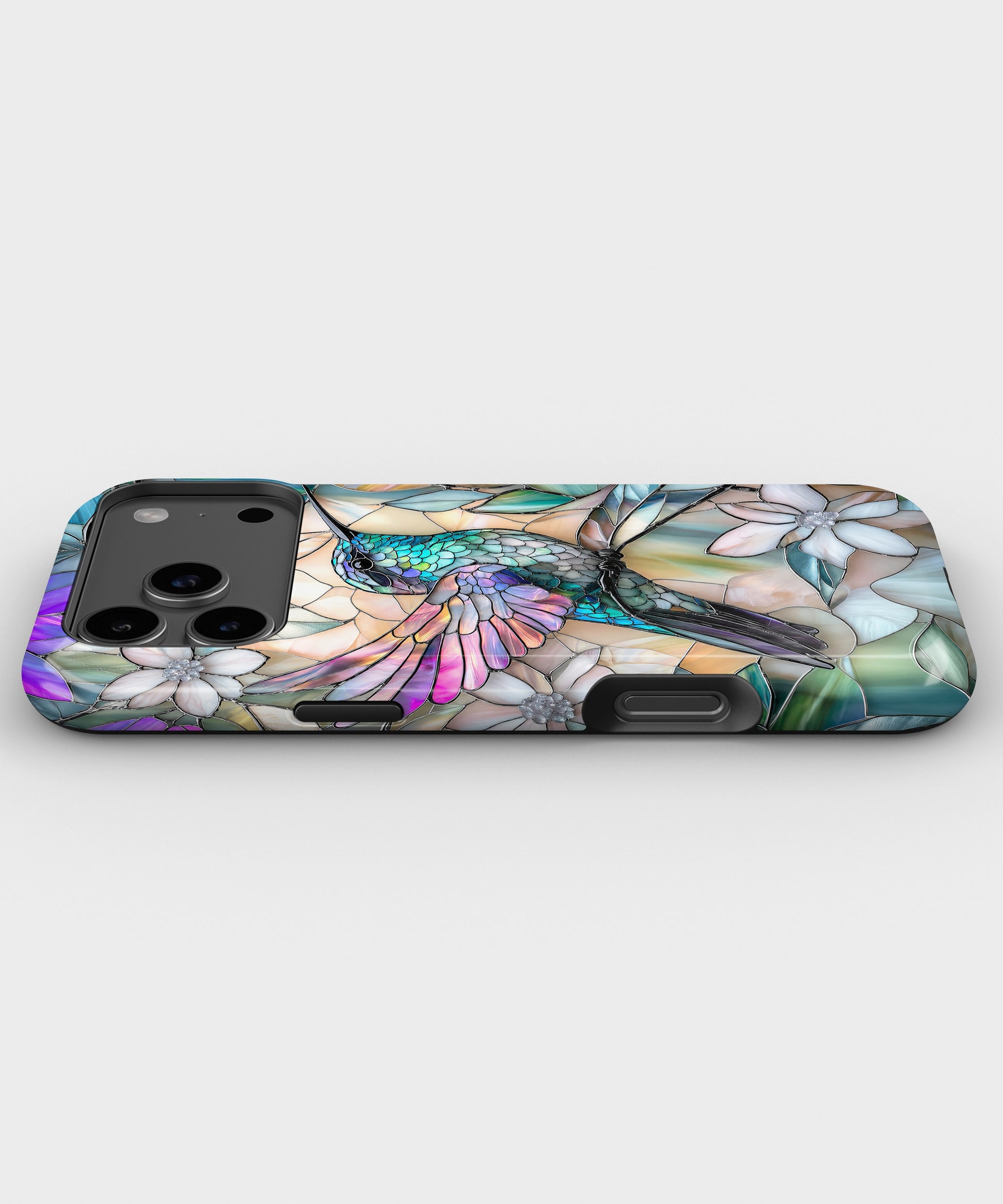 Stained Glass Hummingbird Floral MagSafe iPhone Tough Case low angle lifestyle product view