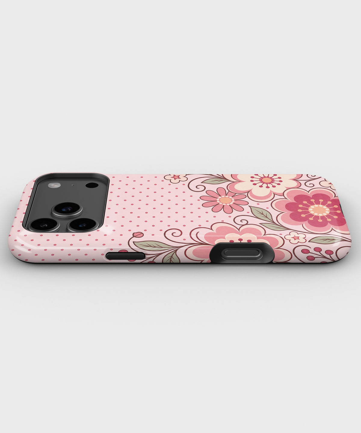 Blush pink Y2K retro floral polka dot tough iPhone case with raised camera and edge protection