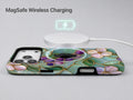 Aqua Grape Stained Glass Floral MagSafe Loop iPhone Case shown with a MagSafe-compatible wireless charger attached