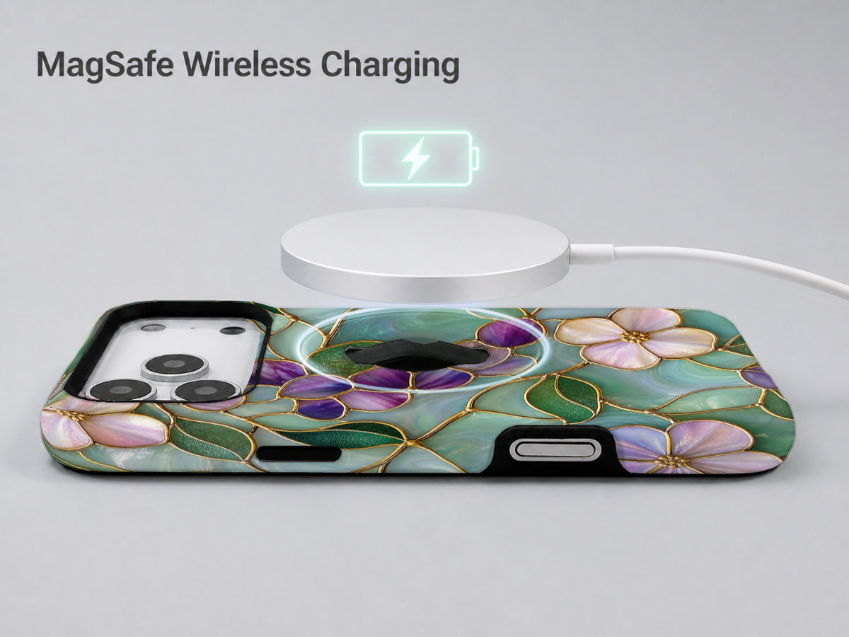 Aqua Grape Stained Glass Floral MagSafe Loop iPhone Case shown with a MagSafe-compatible wireless charger attached