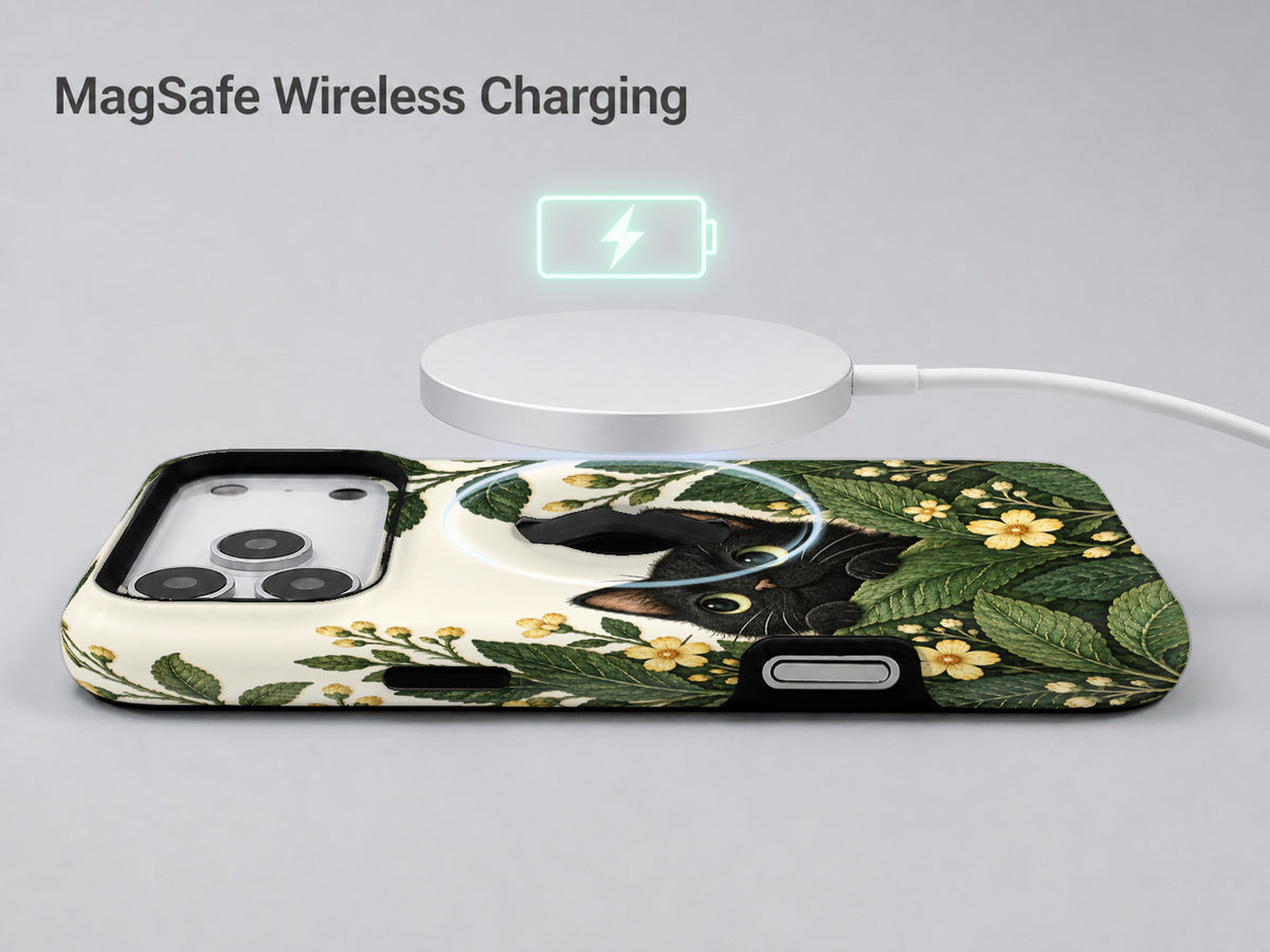 Black Cat Botanical Garden MagSafe Loop iPhone Case, shown with a MagSafe wireless charger