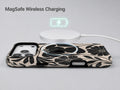 Black Cream Bold Floral MagSafe Loop iPhone Case shown with a MagSafe-compatible wireless charger attached