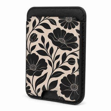 Front view of the Black Cream Oversized Floral MagSafe card holder on a white background