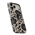 Black Cream Oversized Floral MagSafe Loop iPhone case with built-in finger loop open