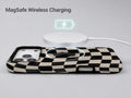 Black Cream Wavy Checkerboard MagSafe Loop iPhone Case shown with a MagSafe-compatible wireless charger attached