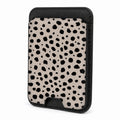 Front view of the Black Dalmatian Spot MagSafe card holder on a white background