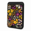 Front view of the Black Folk Garden Floral MagSafe card holder on a white background