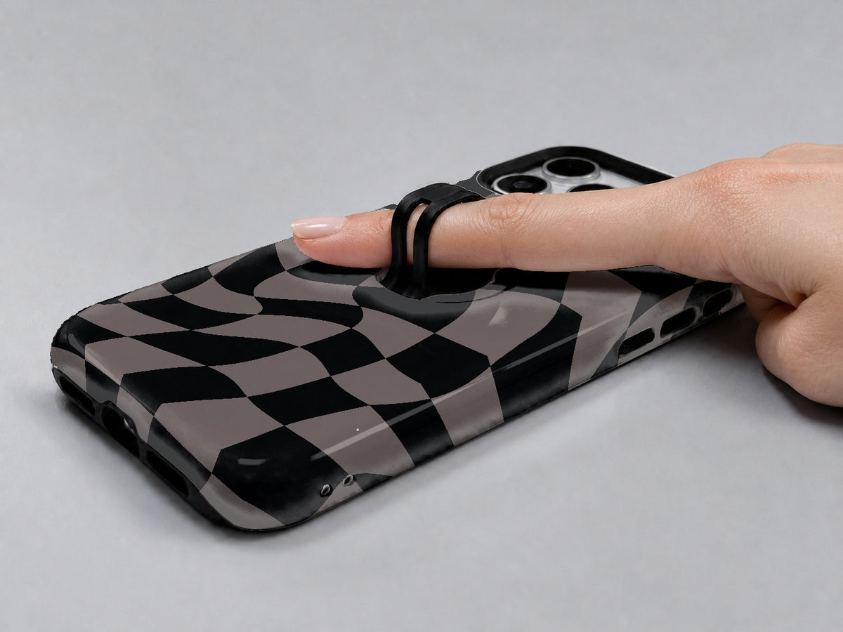 Black Taupe Wavy Checkerboard MagSafe Loop iPhone Case shown in use with a finger through the horizontal loop