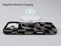 Black Taupe Wavy Checkerboard MagSafe Loop iPhone Case shown with a MagSafe-compatible wireless charger attached