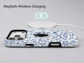 Blue Chinoiserie Floral MagSafe Loop iPhone Case shown with a MagSafe-compatible wireless charger attached