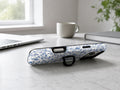 Blue Chinoiserie Floral MagSafe Loop iPhone Case shown in a neutral white professional lifestyle setting