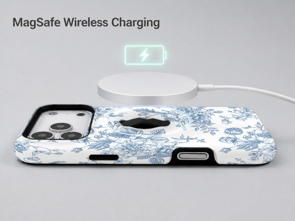 Blue Chinoiserie Rose MagSafe Loop iPhone Case shown with a MagSafe-compatible wireless charger attached