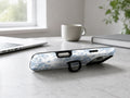 Blue Chinoiserie Rose MagSafe Loop iPhone Case shown in a neutral white professional lifestyle setting