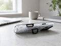 Blue Coastal Seashell MagSafe Loop iPhone Case shown in a neutral white professional lifestyle setting