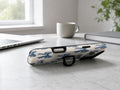 Blue Coquette Bow MagSafe Loop iPhone Case shown in a neutral white professional lifestyle setting