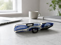 Blue Purple Agate Geode MagSafe Loop iPhone Case shown in a neutral white professional lifestyle setting