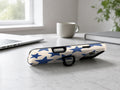 Blue Star Pattern MagSafe Loop iPhone Case shown in a neutral white professional lifestyle setting