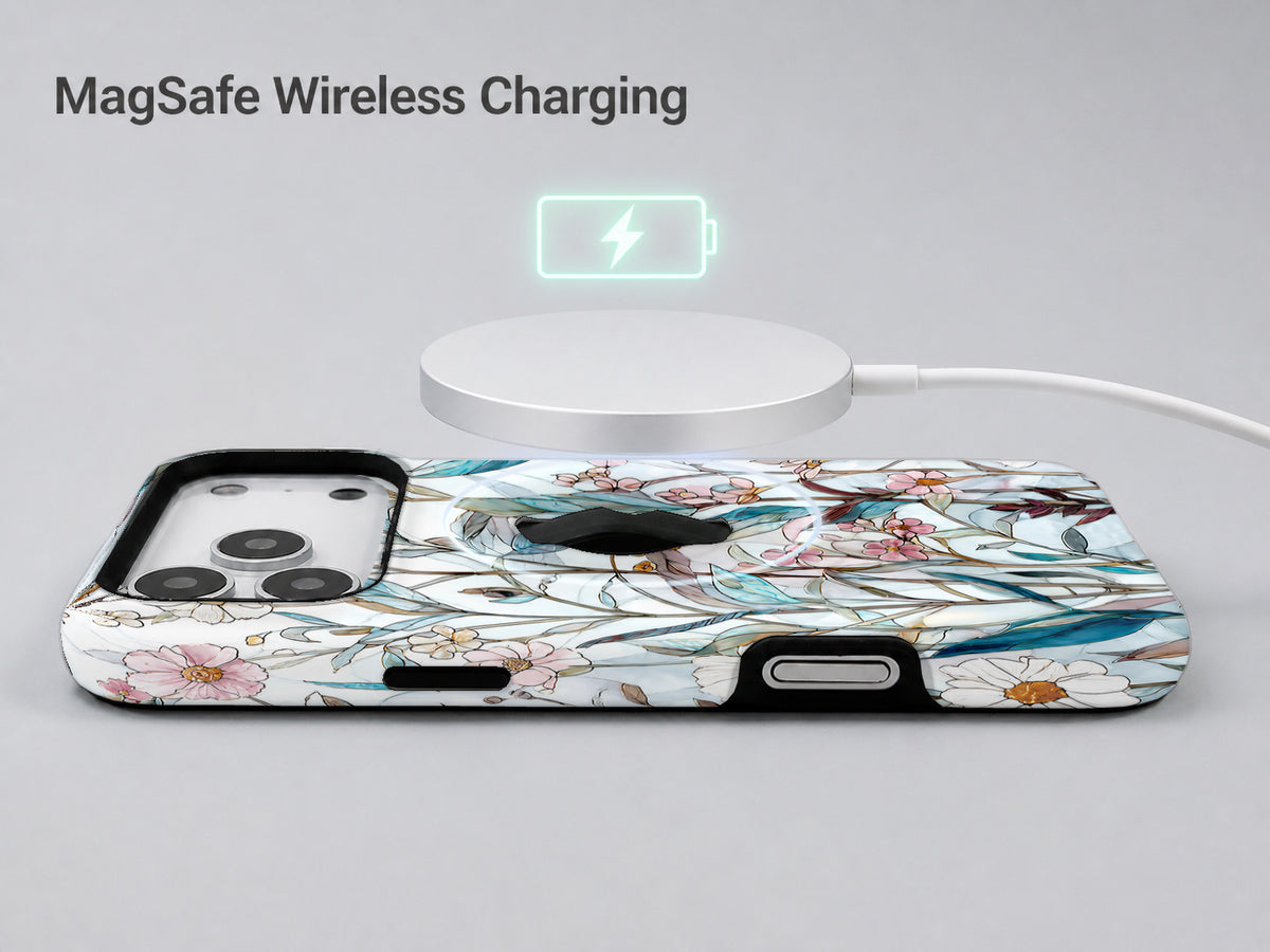 Blue White Daisy Wildflower MagSafe Loop iPhone Case shown with a MagSafe-compatible wireless charger attached