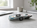Blue White Daisy Wildflower MagSafe Loop iPhone Case shown in a neutral white professional lifestyle setting