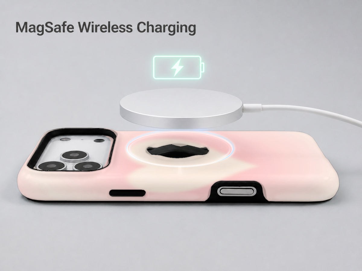 Blush Pink Abstract Gradient MagSafe Loop iPhone Case shown with a MagSafe-compatible wireless charger attached