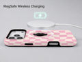 Blush Pink Checkerboard MagSafe Loop iPhone Case shown with a MagSafe-compatible wireless charger attached