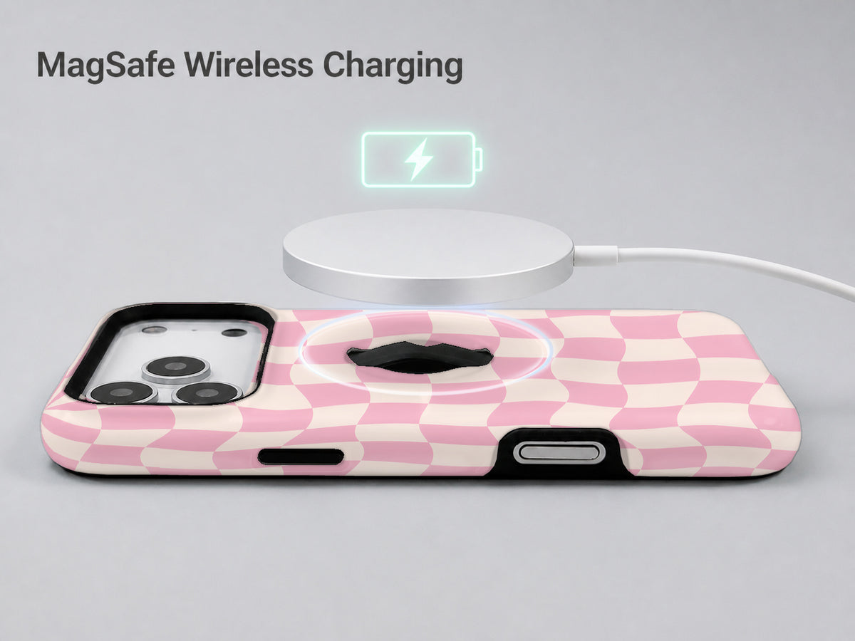 Blush Pink Checkerboard MagSafe Loop iPhone Case shown with a MagSafe-compatible wireless charger attached