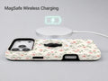 Blush Pink Ditsy Floral MagSafe Loop Case, shown with a MagSafe wireless charger