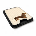 Brown Dachshund on Cream Pinstripes MagSafe Card Holder, angled view showing the thumb access opening