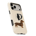 Brown Dachshund on Cream Pinstripes MagSafe Loop Case, angled view with finger loop extended