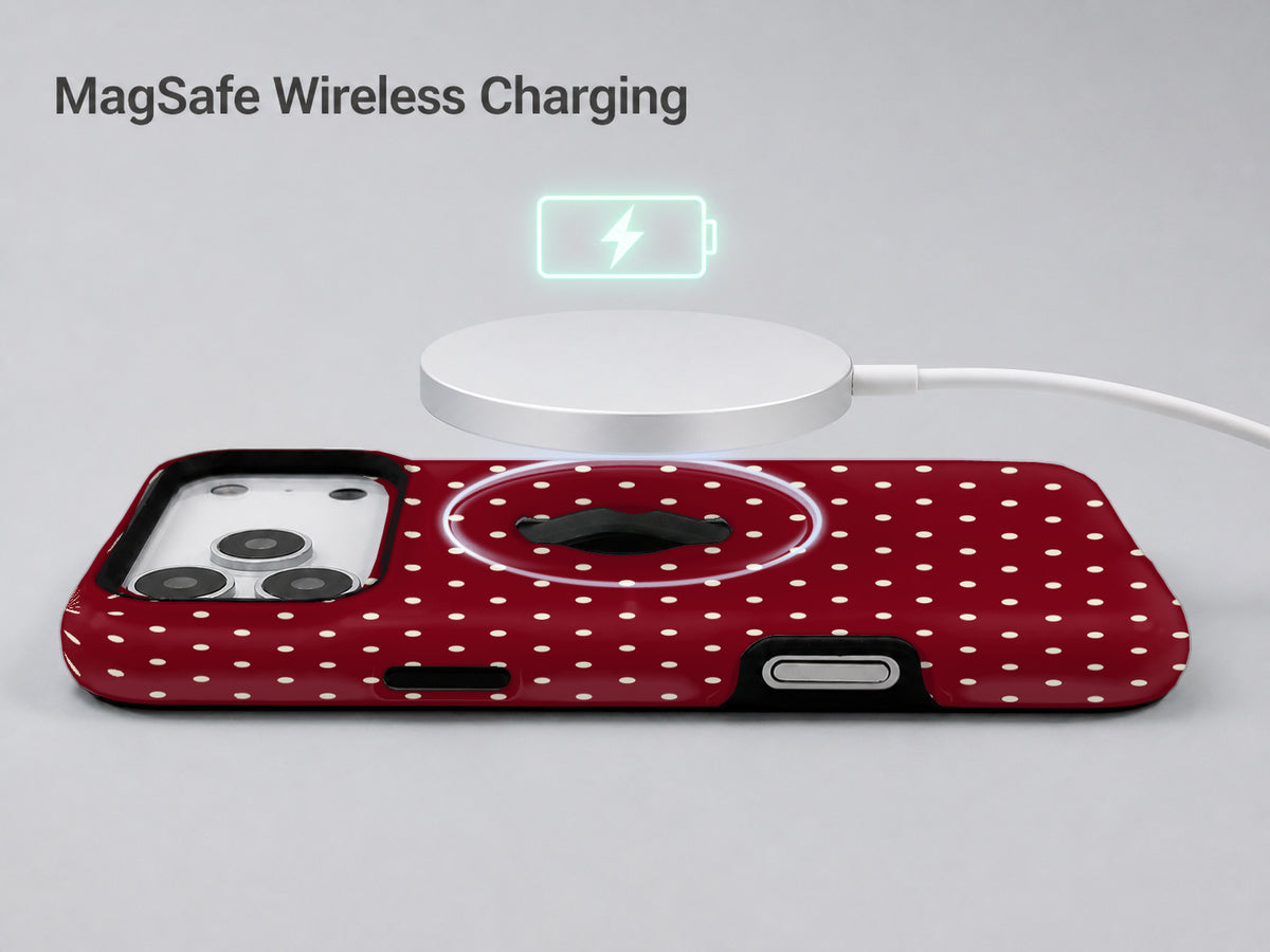 Burgundy Mini Polka Dot MagSafe Loop iPhone Case shown with a MagSafe-compatible wireless charger attached