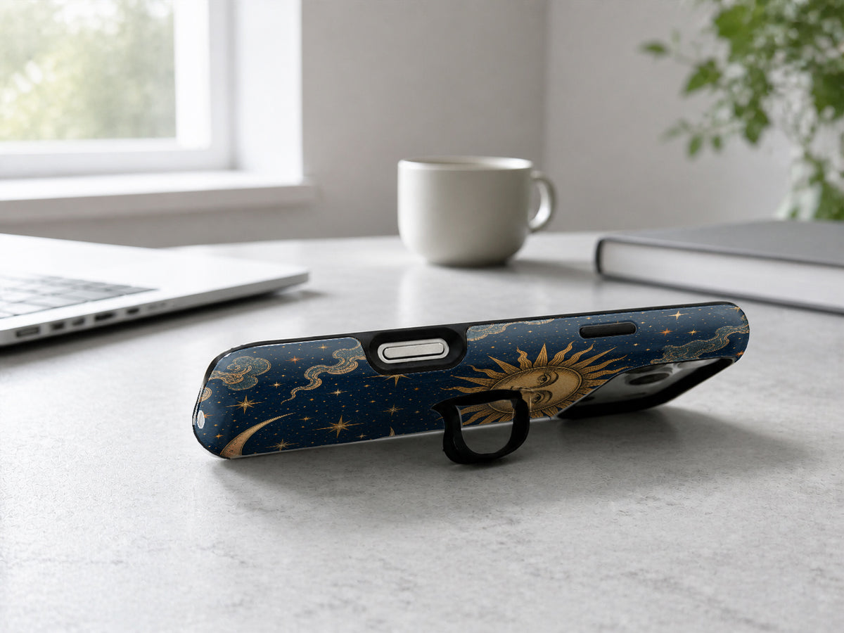 Celestial Sun and Moon MagSafe Loop iPhone Case shown in a neutral white professional lifestyle setting