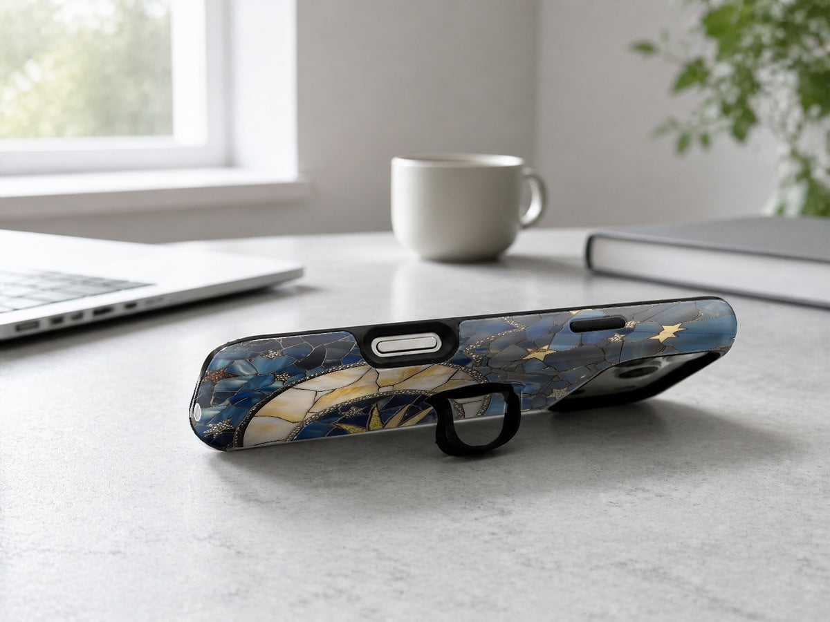 Celestial Sun Moon Compass MagSafe Loop iPhone Case shown in a neutral white professional lifestyle setting