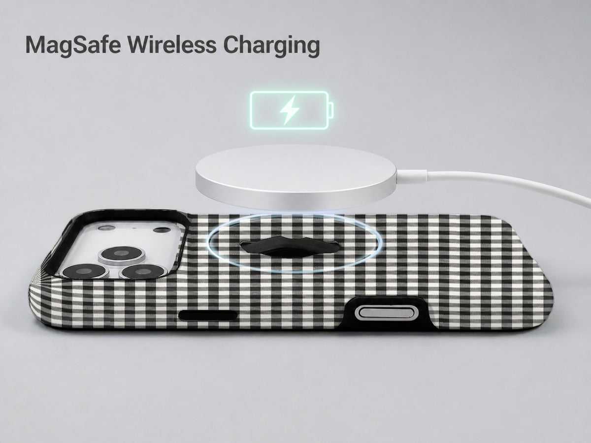 Charcoal Black and White Gingham MagSafe Loop Case, shown with a MagSafe wireless charger
