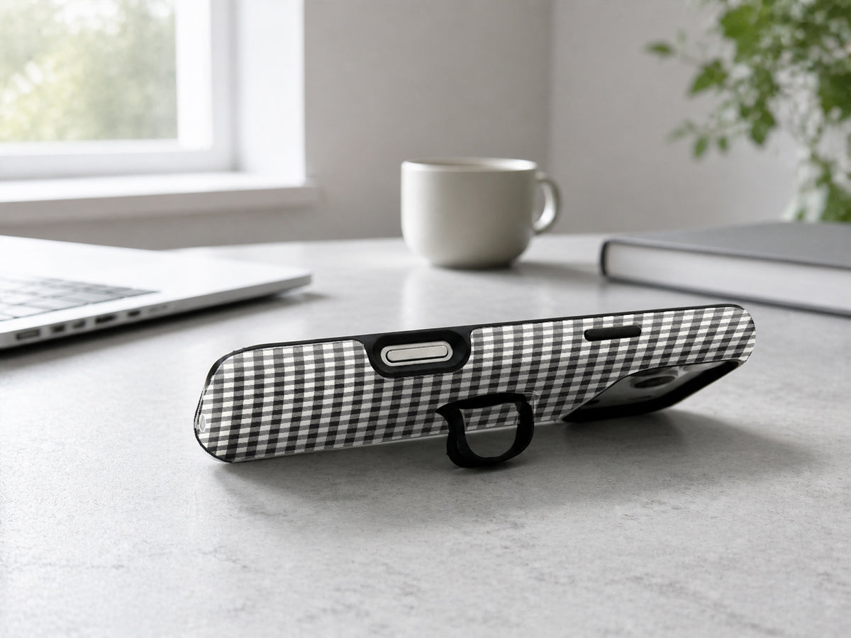 Charcoal Black and White Gingham MagSafe Loop Case, shown as a hands-free kickstand