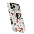 Christmas Bow and Mistletoe MagSafe Loop iPhone case with built-in finger loop open