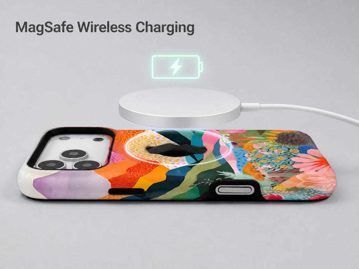 Colorful Abstract Landscape Floral MagSafe Loop iPhone Case shown with a MagSafe-compatible wireless charger attached