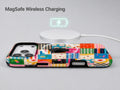 Colorful Folk Quilt Patchwork MagSafe Loop iPhone Case shown with a MagSafe-compatible wireless charger attached