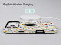 Colorful Pressed Wildflower MagSafe Loop iPhone Case shown with a MagSafe-compatible wireless charger attached